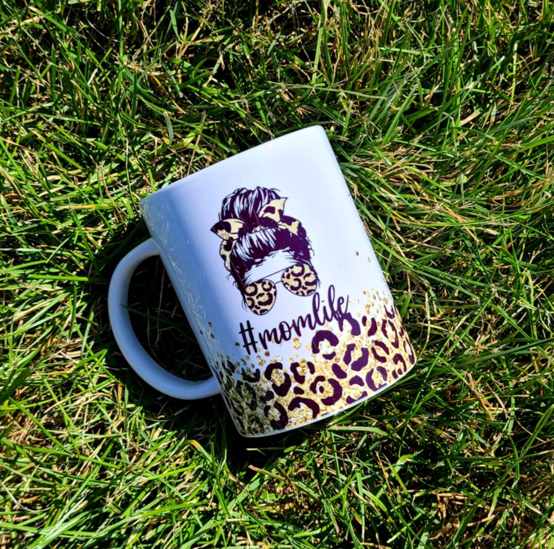 https://kenziesboutique1.myshopify.com/cdn/shop/products/cheetahmomlifecoffeemugsublimation_1.jpg?v=1651173516&width=1445